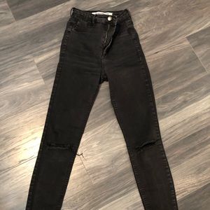 Black distressed skinny jeans